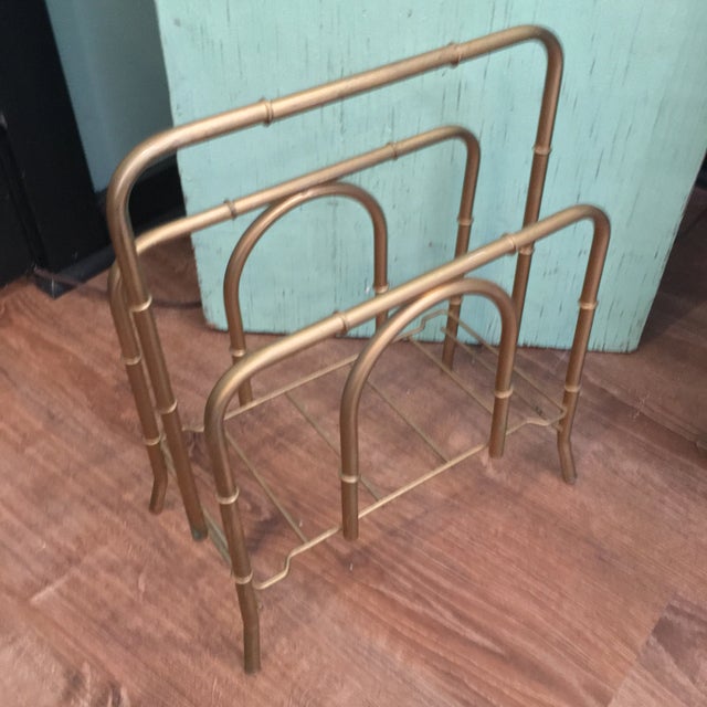 Vintage faux bamboo brass magazine rack. Great storage and great style with the perfect vintage patina. Mid Century,...