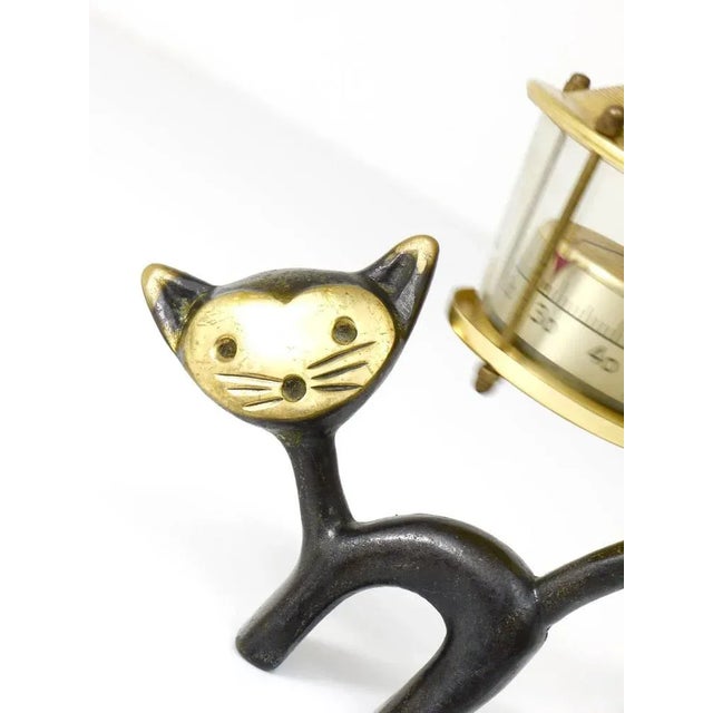 A very charming Austrian desk thermometer, consisting of a nice cat figurine and a lantern-shaped thermometer. A very...