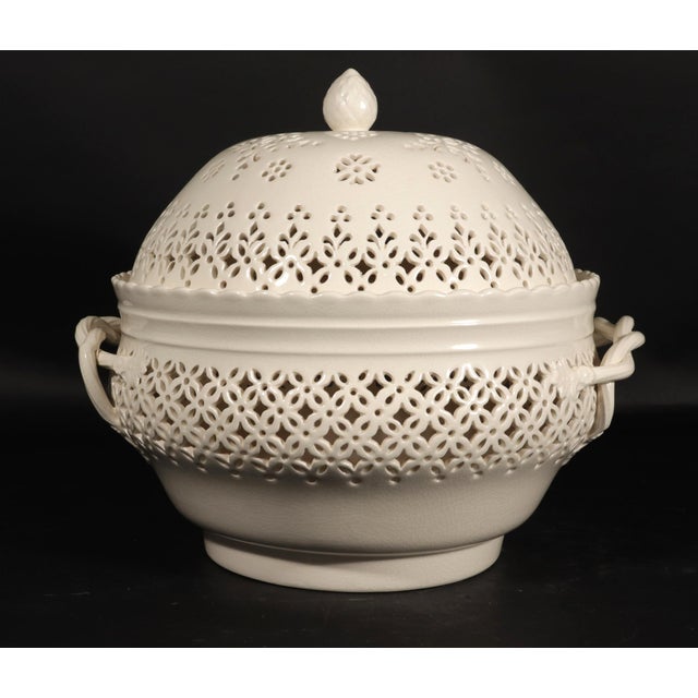 Leedsware Classical Creamware Covered Pierced Chestnut Basket and Stand, 20th Century The covered creamware basket has...