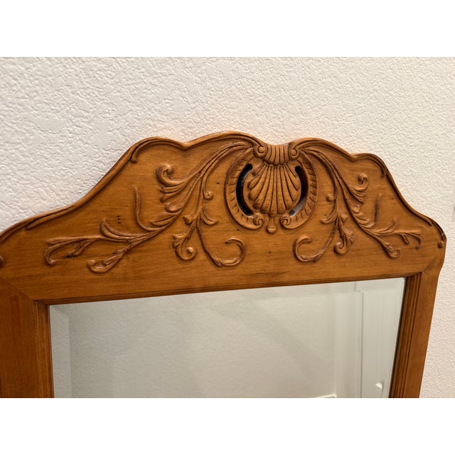 Ethan Allen French style wall mirror is part of the Legacy collection; frame is solid maple with original factory-...