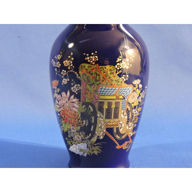This hand painted Japanese Satsuma Ware cobalt blue porcelain mid-century modern round vase was made in the Satsuma...