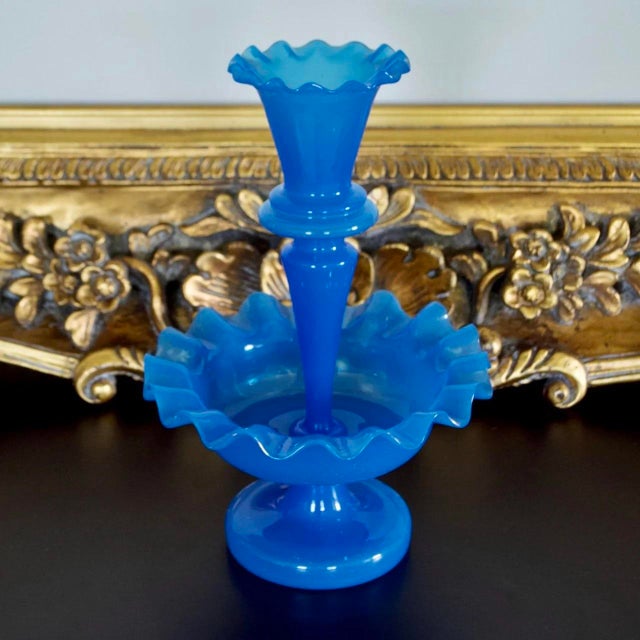 Antique mid-19th century epergne by Boston & Sandwich Glass Co., dating to circa 1860. Rendered in a rich blue glass, this...