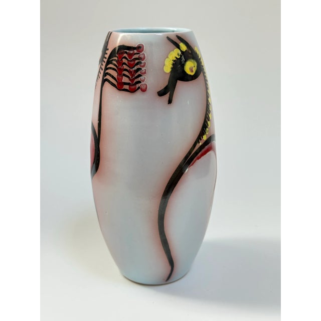 The most charming base I’ve seen in a while. This beauty is glazed with hand painted, stylized horses chasing each other...