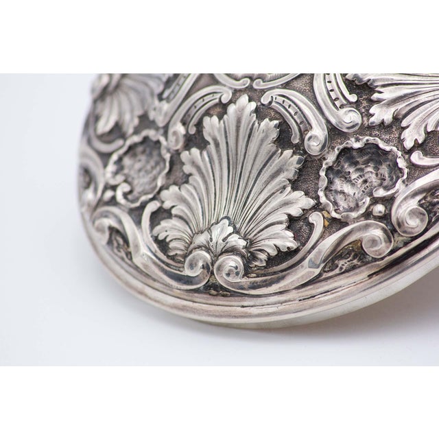 Embossed Silver Scullery with Circular Shells, Removable Lid Knob and Cut-Out Feet, in Very Good conditions. Designed 1920...