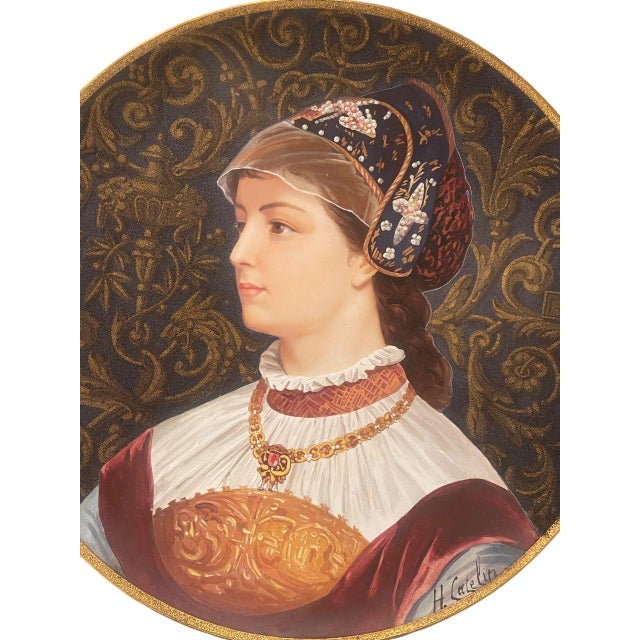 An exceptional and highly decorative late 19th century French portrait charger produced by the esteemed faience...