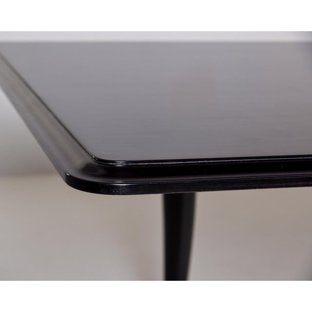 Found in England, from the estate of musician Nick Cave, this butterfly leaf dining table dates from the late 1950s /...