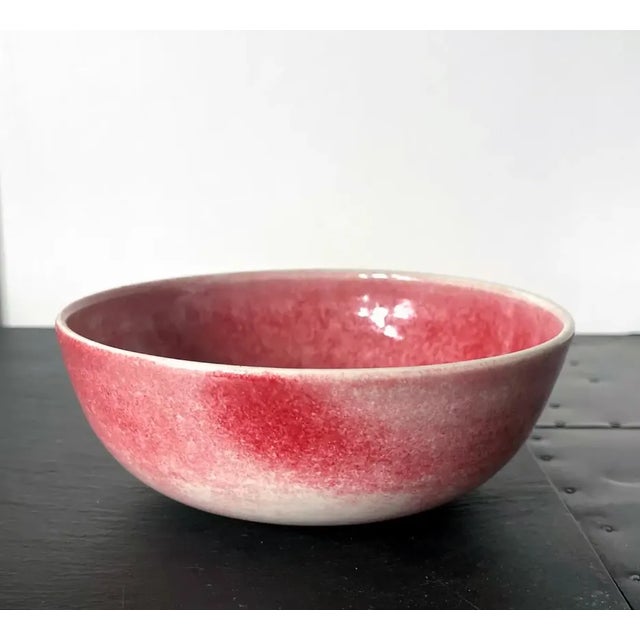 An early ceramic round bowl with a flat foot ring studio crafted by Brother Thomas Bezanson (1929-2007) circa 1970-80s....