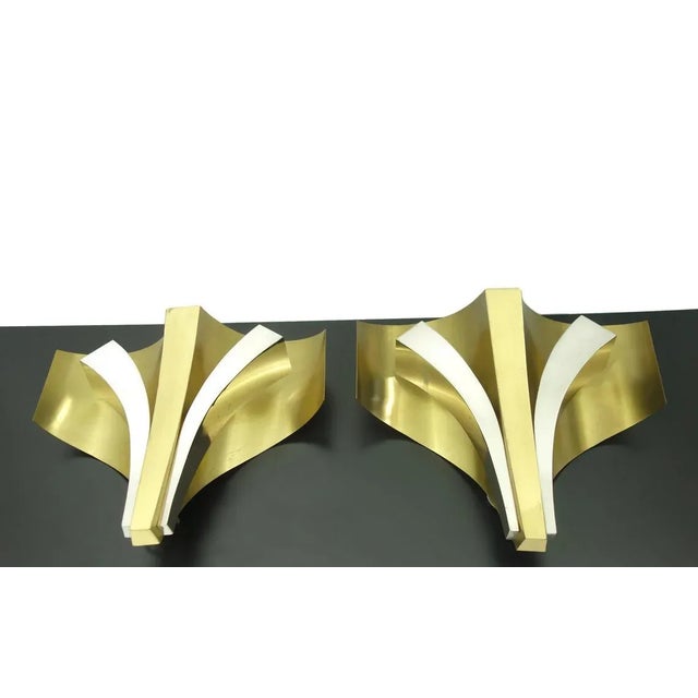A pair of c1960's French Modernist Signed Maison Bagues Paris Duo Toned Silver and Gilt Metal Formed Wall Sconces. 3 bulbs...