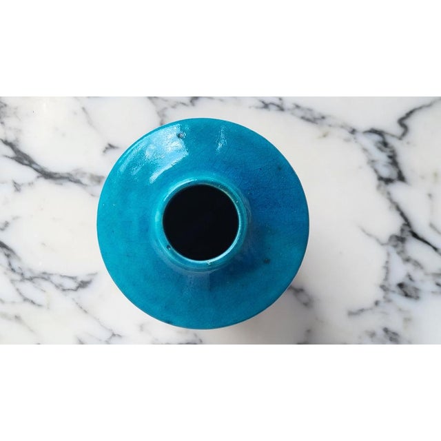 Rare and beautifully minimalist 1960s vase with electric blue and turquoise glaze on black designed by Jan Bonties van...
