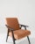 Produced in the former Czechoslovakia, this upholstered armchair is from circa 1960. Re-upholstered with a vibrant color,...