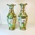 This antique pair of Chinese porcelain Famille Rose monumental vases are impressive when displayed together on a mantel or...