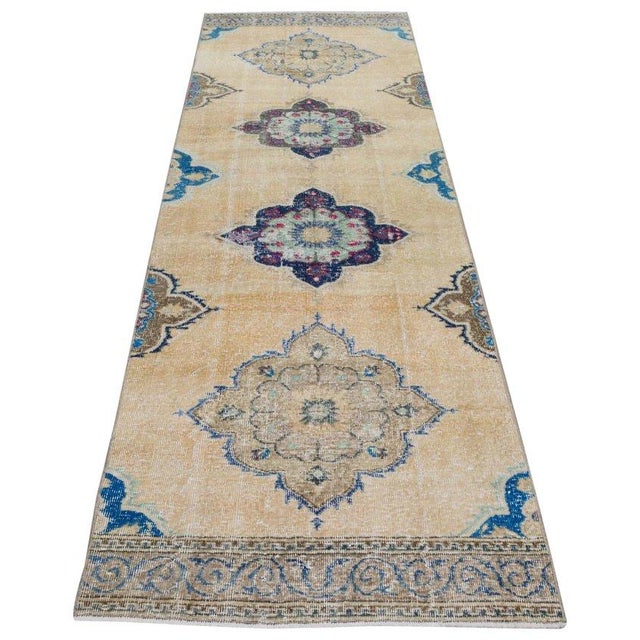 Hand-knotted with care using traditional rug-making techniques, this wool rug blends timeless craftsmanship with a modern...