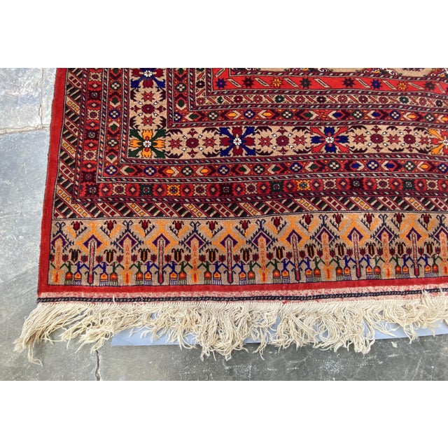 his Handmade Kurdish Tribal Rug features an intricate geometric medallion pattern in vibrant shades of red, blue, yellow,...