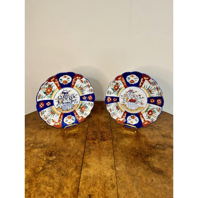 Quality pair of antique Japanese imari plates, having a quality pair of antique Japanese imari plates decorated with a...
