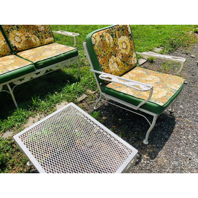 Vintage Wrought Iron Outdoor Patio Seating Add some vintage charm to your outdoor space with this beautiful conversation...