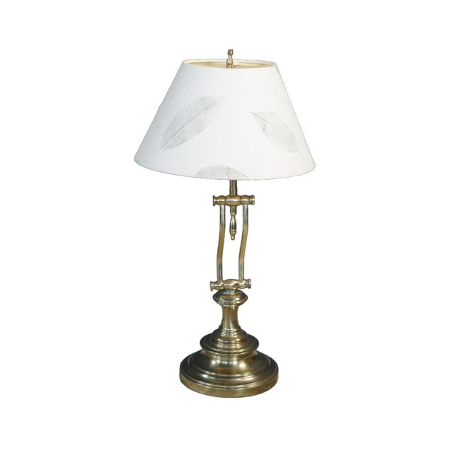 This vintage Stiffel solid brass adjustable desk lamp—ideal as a banker's, student, or piano lamp—features a heavy, tiered...