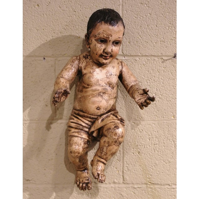 This antique baby Jesus figure was crafted in Italy, circa 1780. The hand-painted putti carving feature its original...