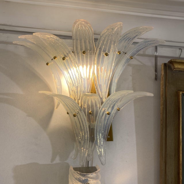 Exquisite set of two wall sconces in opaline glass and internal structure in gold brass. Original Barovier & Toso wall...