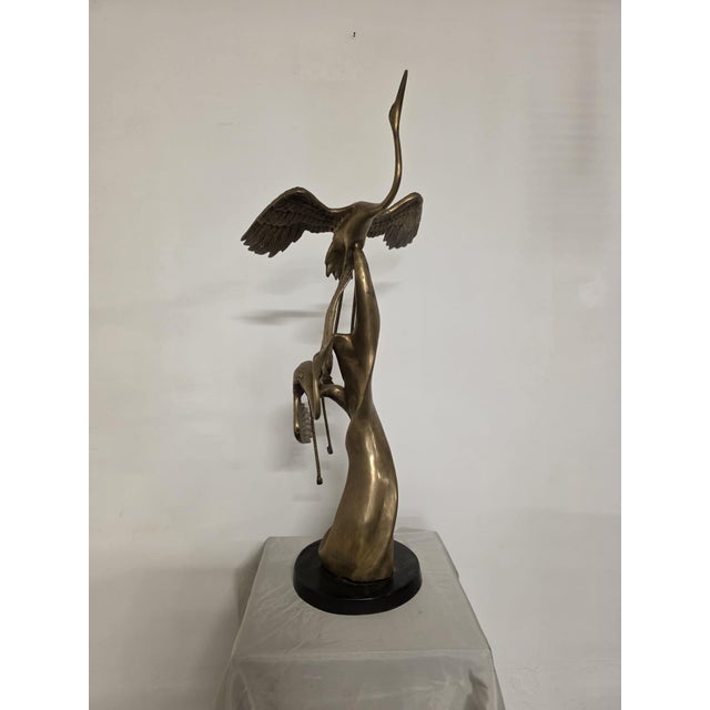 Brass sculpture depicting gray herons. Elegant and refined brass sculpture from the 1940s. The sculpture is in true Art...