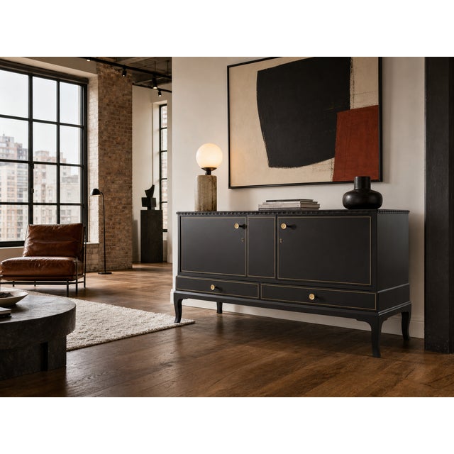 Totally restored 1940s sideboard in absolute mint condition. Matte black with razor-sharp frames in gold leaf and red...