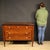 Mid-20th-century Italian chest of drawers. Finely veneered and inlaid with geometric decorations in walnut, rosewood,...