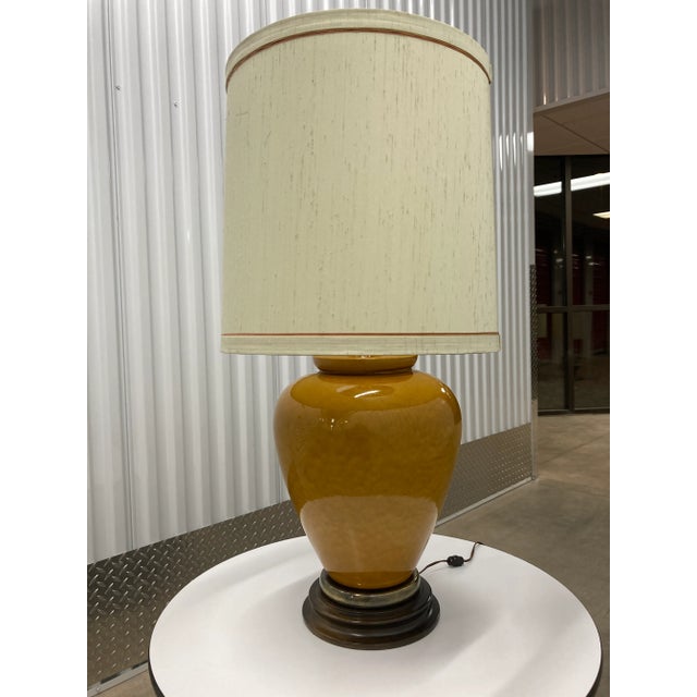 Large porcelain ginger jar table lamp, with burnt orange crackle glaze finish, hardwood base, brass trim, and large...