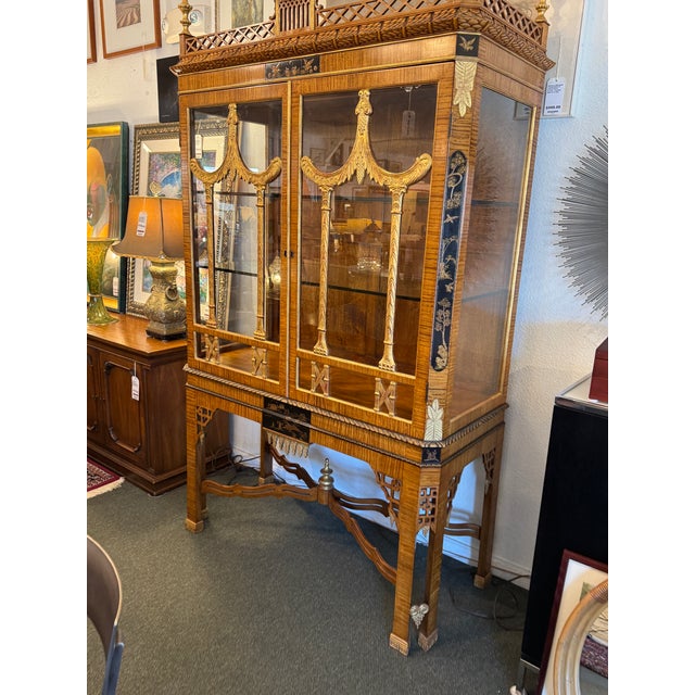 Design Plus Gallery presents a Vitrine Cabinet in the George III Style from Burton Ching. The cabinet is made of fruitwood...