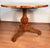 Biedermeier Walnut Round Table, 19th Century Elegant 19th-century Biedermeier round table, crafted in walnut and featuring...