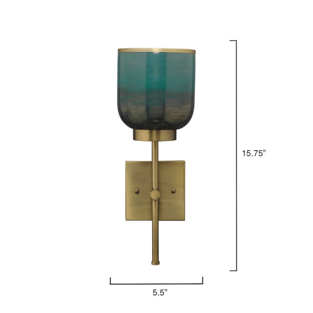 This stunning sconce was inspired by soft fog, glimmering in the afternoon sun, creating a beautiful finish on these...