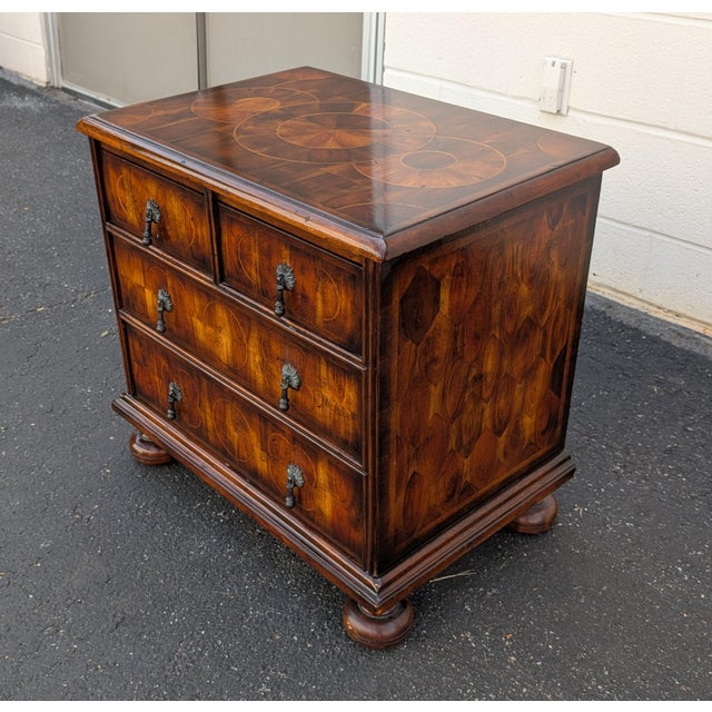 This exceptional Theodore Alexander style gentleman's chest serves as a commanding statement piece or an oversized...