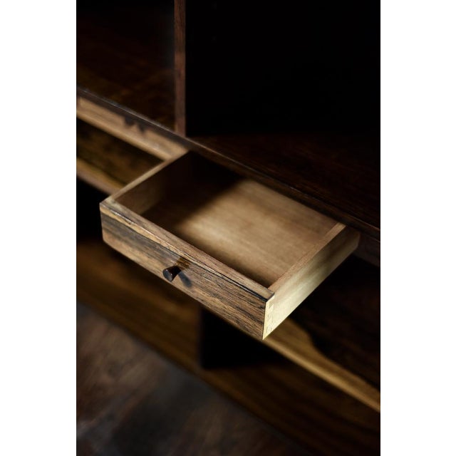 This cabinet was designed during the 1960s by Erik Brouer for the Danish manufacturer Brouer Møbelfabrik. It is made of...