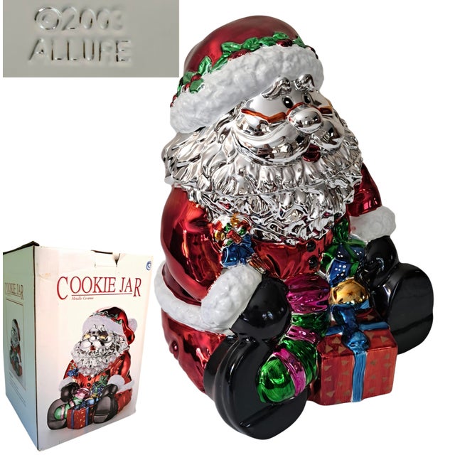 A charming vintage 2003 Allure metallic ceramic Santa Claus cookie jar, complete with its original box. This retired...