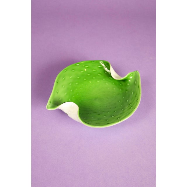 Beautiful two tone 1950's hand blown Murano controlled bubble glass catchall. The interior features a striking mint green...