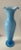 Stunning 17” tall empoli vase in light blue cased glass makes an impact in any room. Footed you can see the royal blue...