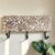Enhance your home decor with the White Washed Carved Mango Wood 3 Hook Wall Rack, a perfect blend of functionality and...
