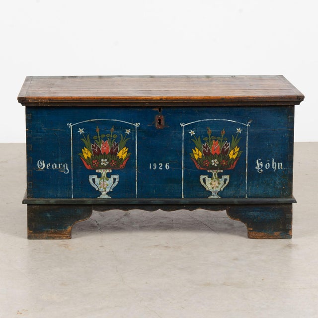 Vintage flat-top trunk dated 1926, crafted in pine with dovetail construction and its original cobalt blue hand-painted...