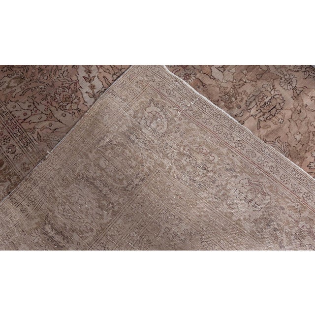 A masterful expression of Ottoman elegance, this 1920s Turkish Hereke rug captures the refined artistry and cultural...