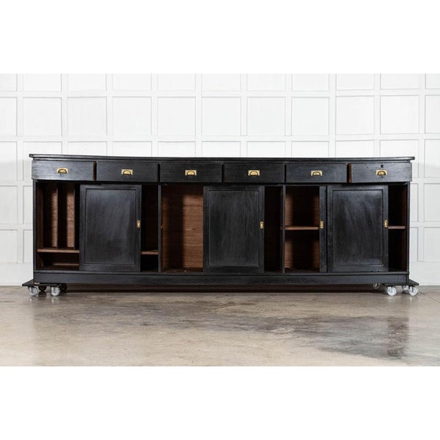 circa 1900 Monumental Ebonised English Oak Dresser Base W231 x D58 x H107 cm Right hand side internal shelf depth 50.5 cm...