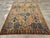 A vintage Chinese Art Deco accent carpet handmade during the mid-20th century. Measures: 6' 1" x 8' 11"