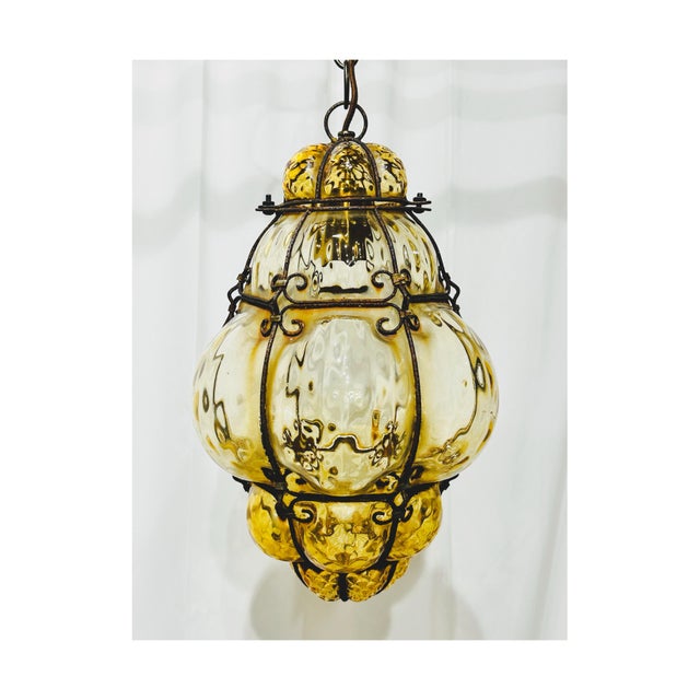 Vintage Mid Century Modern Hand-blown amber glass, squeezed through a scrolled wrought iron cage the old Venetian way — no...