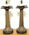 Pair of British Colonial-Style Bronze Palm Tree Lamps with Carved Tribal Motifs A striking and highly decorative pair of...