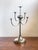 An expressive example of late 20th-century Hungarian metalwork, characterized by five sweeping curved arms arranged at...
