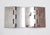 Vintage blank steel door hinges with flat tips, five knuckles, and no hole pattern. Good condition with surface wear and...