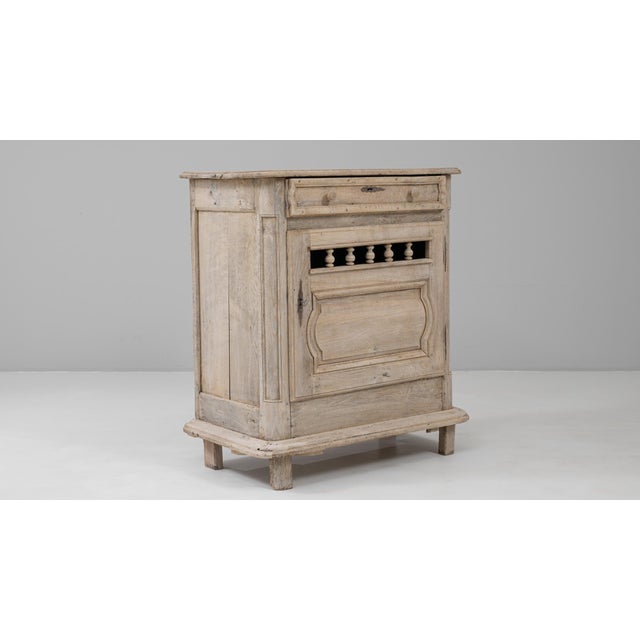 This 19th Century French Oak Buffet showcases the rustic elegance of provincial craftsmanship with its simple yet refined...