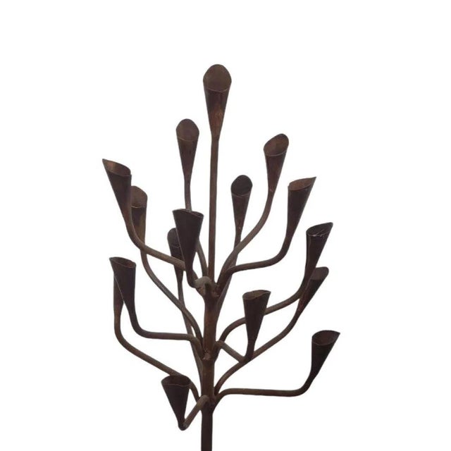 This stunning wrought iron 16-light candle holder tree makes a bold statement in any room. With its intricate, tree-like...