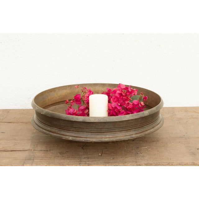 This 21-inch Urli is an extraordinary found artifact, hand-cast by master metalsmiths in Kerala using the heritage lost-...