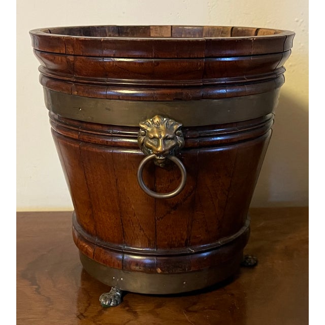 Antique 19th century Dutch mahogany coopered cachepot or wine bucket. Lion mask ring handles, copper liner and animal paw...
