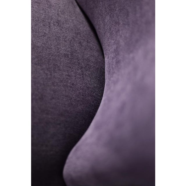This rare, modernist wing chair was manufactured in Denmark during the 1950s. It seamlessly combines classic aesthetics...