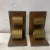 Beautiful pair of bookends with a brass scroll design which gives them an Art Deco vibe from the 1940s. Perfect for a home...