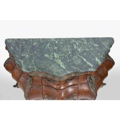 Set of 3 furniture pieces, realized in the late 19th century following a 18th century taste. Comprising a central bombe...